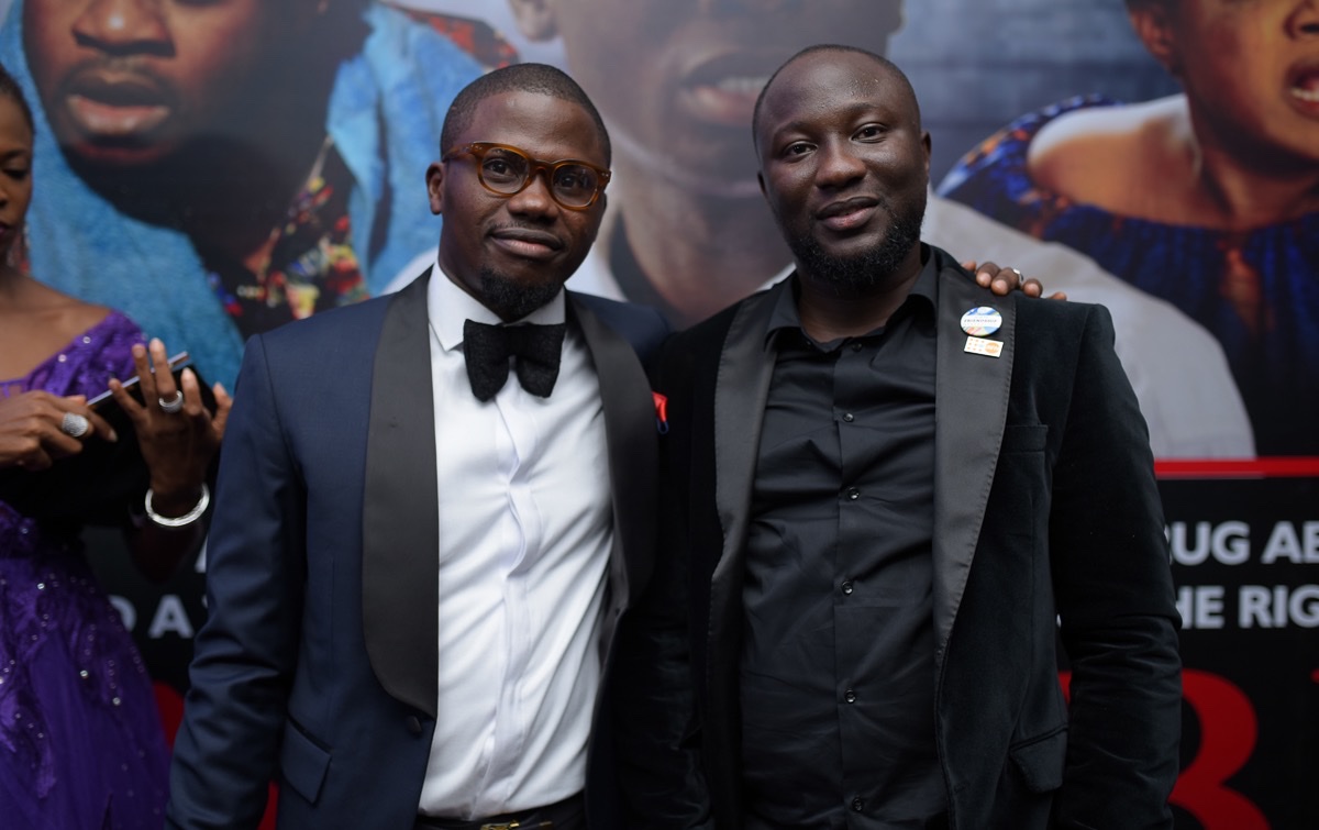 Seun Dania on the NIMBE poster wall at the film's Lagos premiere